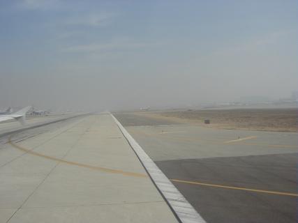 Runway at LAX (lots of fog/smog)<br>Location: LAX airport
